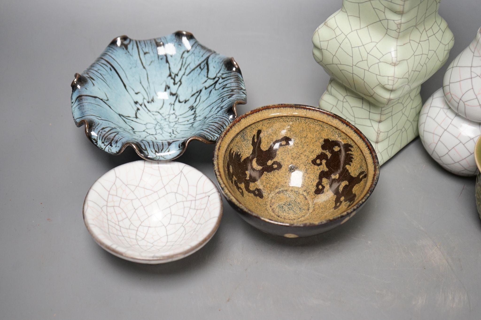 Chinese ceramics: three bowls, a cup and two vases, tallest vase 23cm